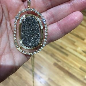 Gold toned long necklace